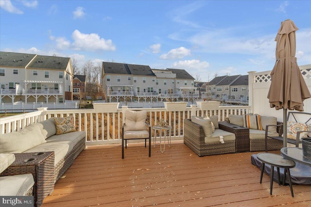 wooden deck featuring an outdoor living space