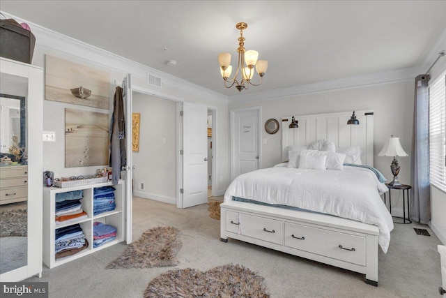 carpeted bedroom with crown molding and an inviting chandelier