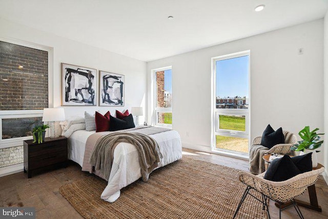 bedroom featuring dark hardwood / wood-style flooring