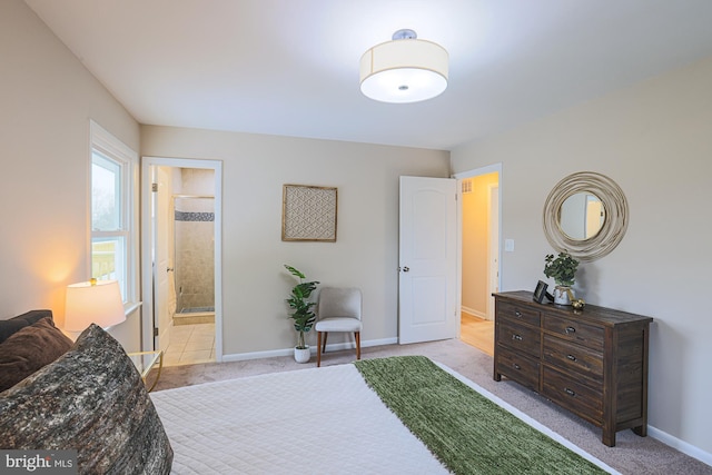 carpeted bedroom with ensuite bathroom