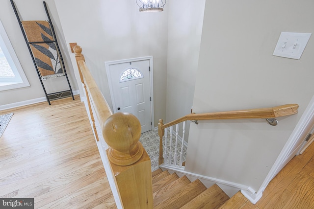 foyer entrance featuring plenty of natural light and light hardwood / wood-style flooring