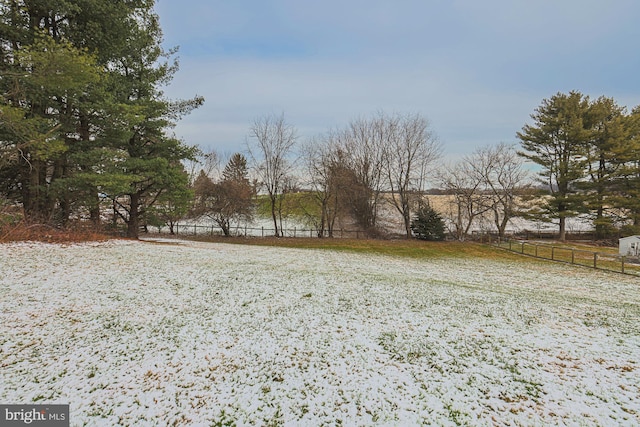 view of yard with a rural view