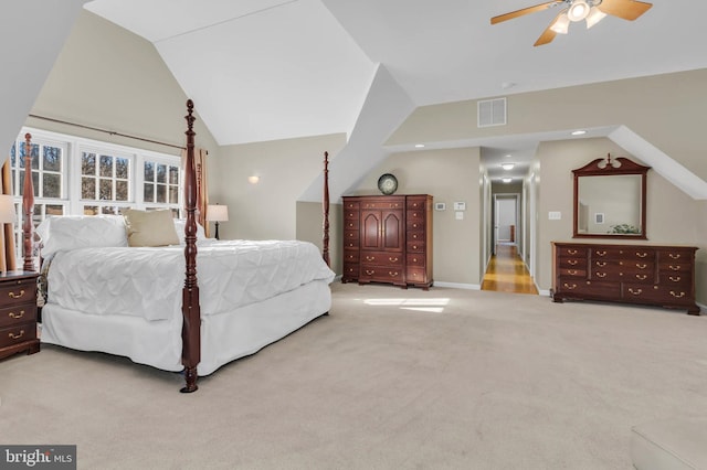 carpeted bedroom with lofted ceiling and ceiling fan