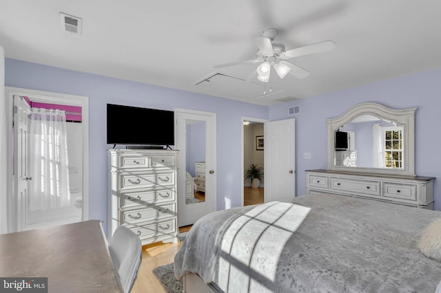 bedroom featuring light hardwood / wood-style floors and ceiling fan