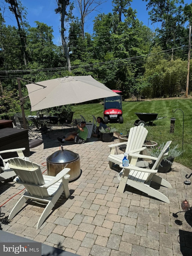 view of patio featuring a fire pit