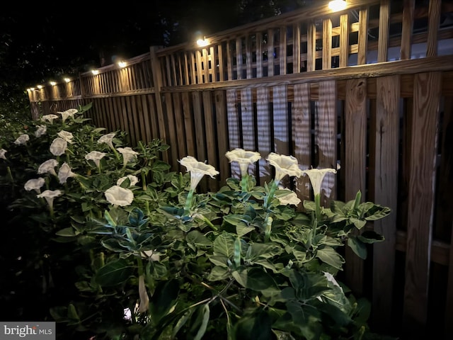 view of yard at twilight