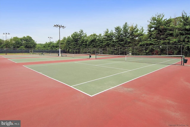 view of tennis court with basketball court