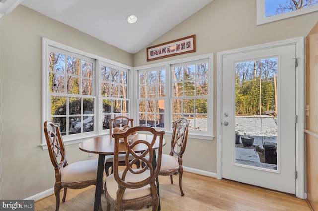 sunroom / solarium with lofted ceiling