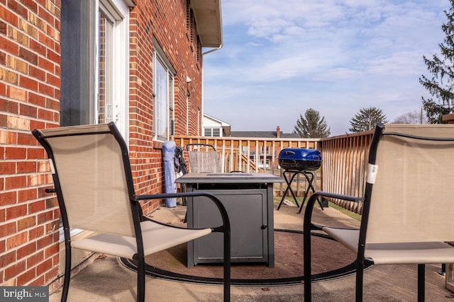 balcony featuring area for grilling