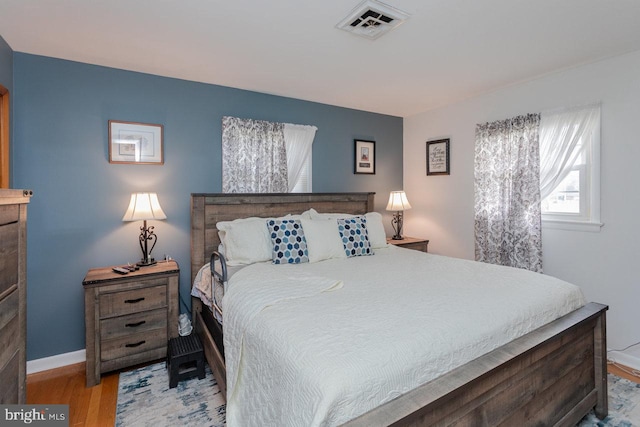 bedroom featuring light wood-type flooring