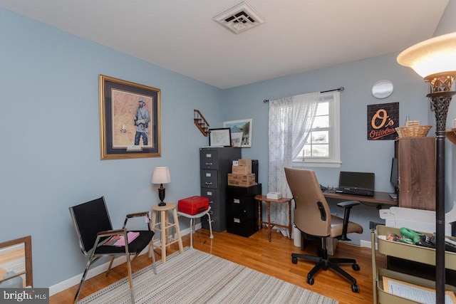 office space featuring light hardwood / wood-style floors