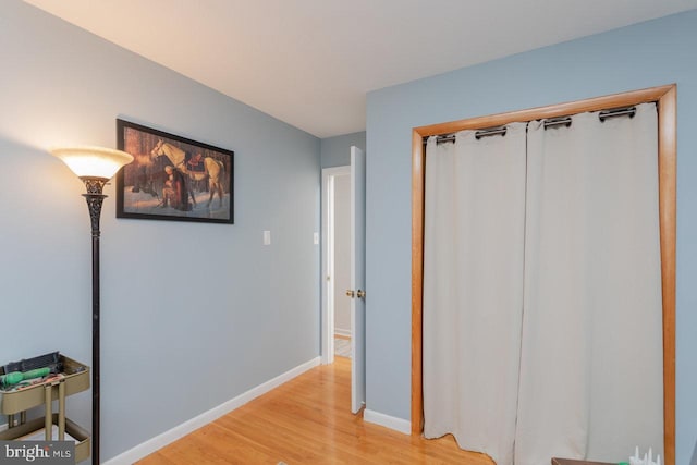 hallway featuring light wood-type flooring