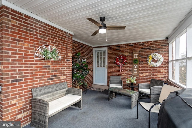 sunroom / solarium with ceiling fan