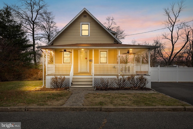 farmhouse inspired home featuring covered porch