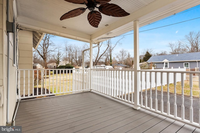 wooden deck with ceiling fan