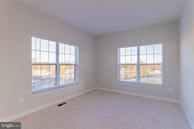 627 Halsey Way, Oxon Hill, MD 20745 - unfurnished room featuring carpet and plenty of natural light