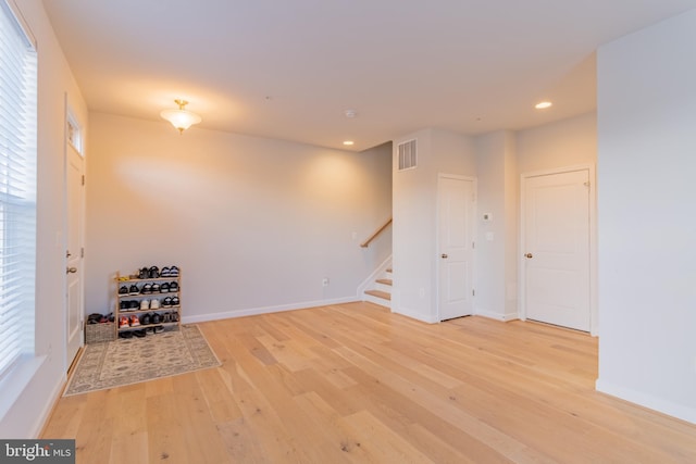 627 Halsey Way, Oxon Hill, MD 20745 - empty room with stairs, light wood-style flooring, and recessed lighting