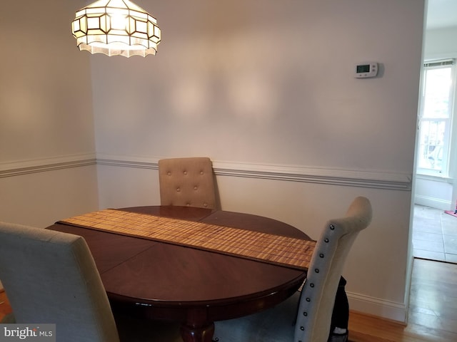 dining room with hardwood / wood-style floors