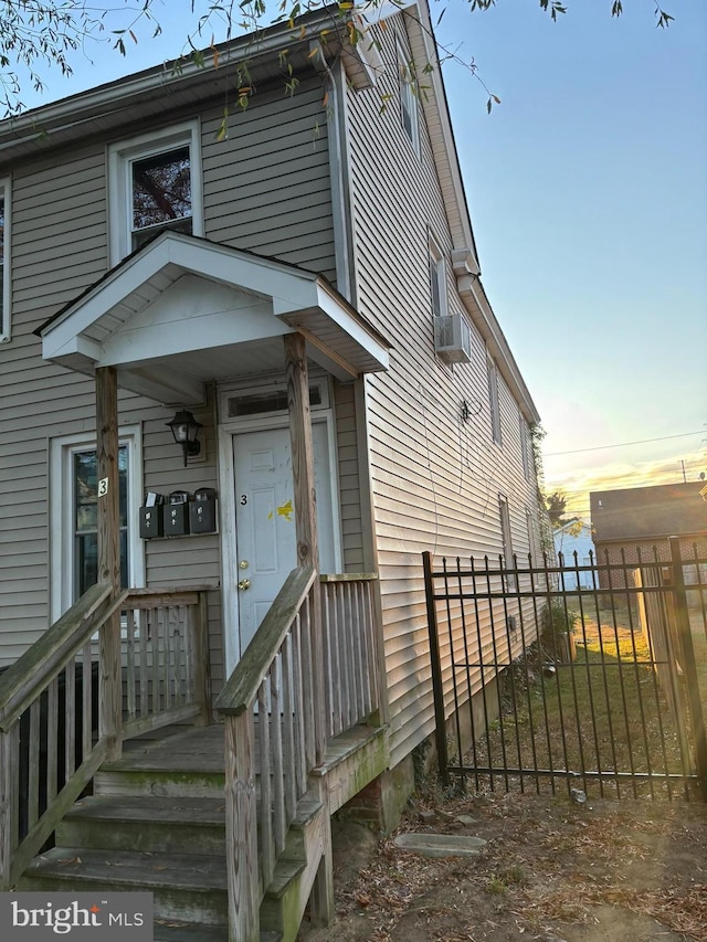 view of front of house with cooling unit