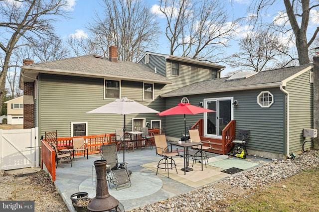 rear view of property with a patio area