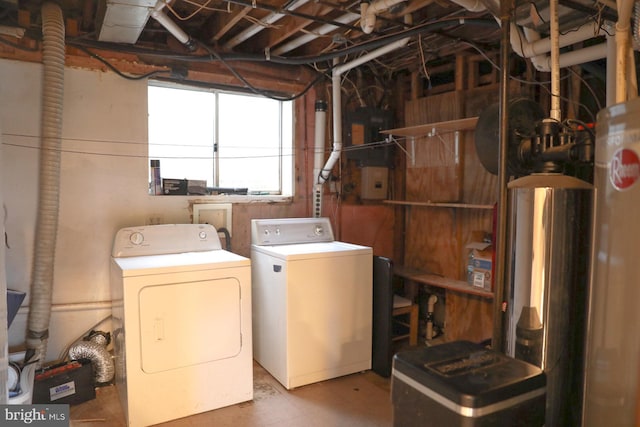 washroom with washing machine and clothes dryer