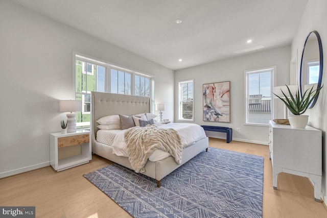 bedroom with hardwood / wood-style flooring