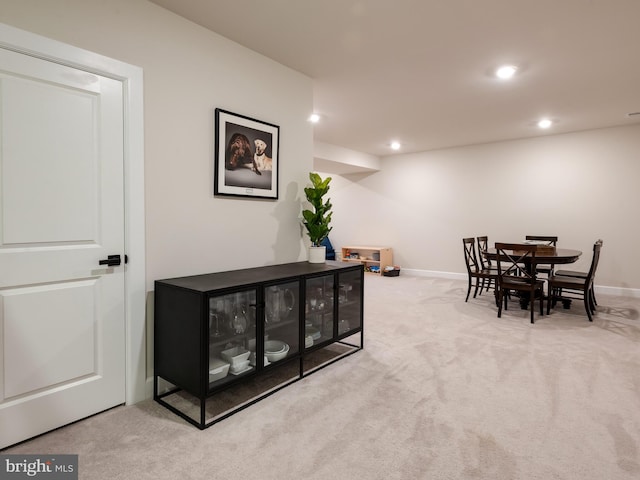 view of carpeted dining area