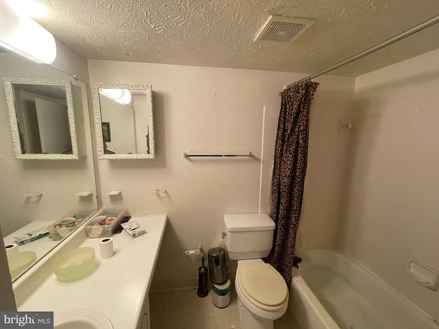 full bathroom featuring vanity, shower / tub combo, a textured ceiling, and toilet