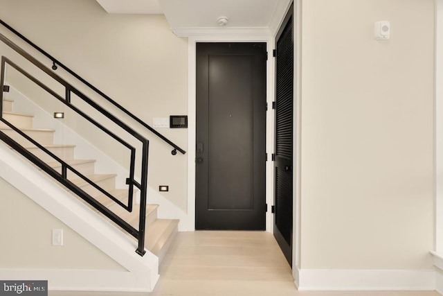 foyer with light wood-type flooring