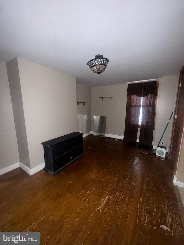 interior space with dark hardwood / wood-style flooring