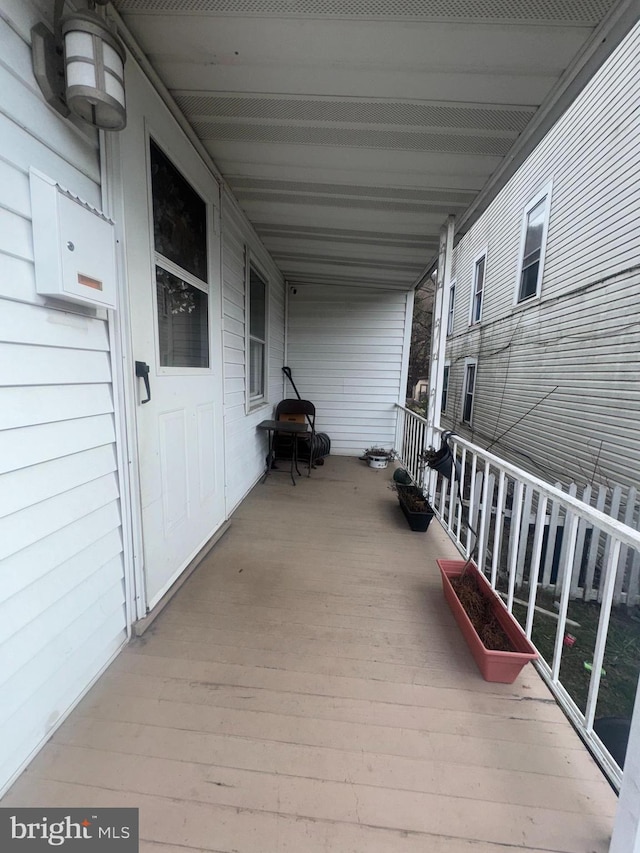 wooden deck with covered porch