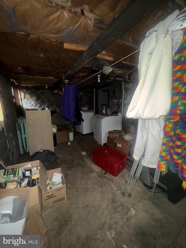 basement featuring washing machine and dryer