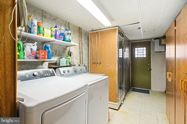 washroom with washer and dryer