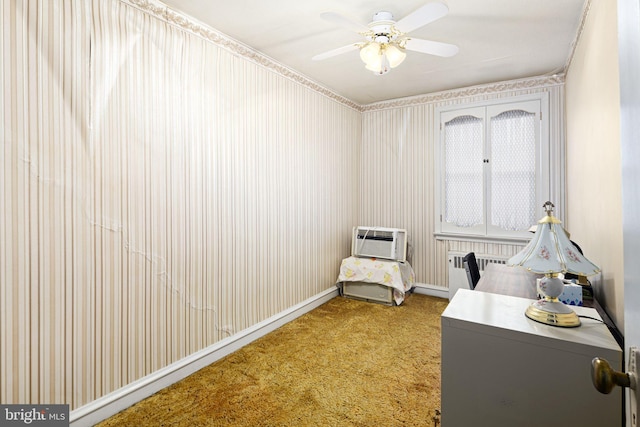 unfurnished bedroom with ceiling fan, carpet, and a wall mounted air conditioner