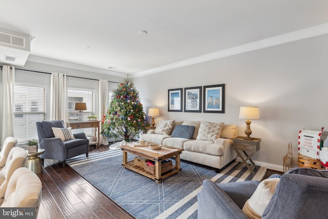 living room featuring dark hardwood / wood-style floors and crown molding