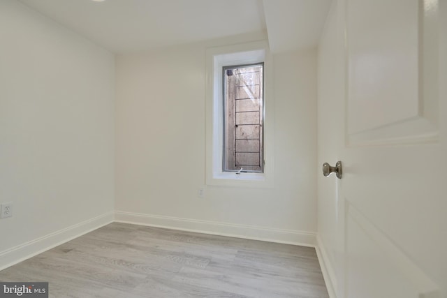 unfurnished room featuring light wood-type flooring