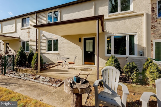 back of house featuring a patio and central AC