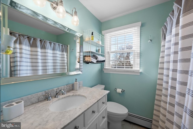 bathroom featuring walk in shower, vanity, toilet, and baseboard heating