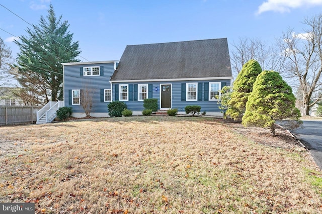 view of front of home with a front lawn