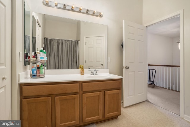 bathroom with vanity and walk in shower