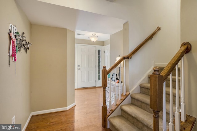 entryway with light hardwood / wood-style flooring