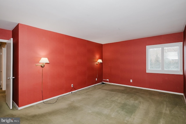 view of carpeted spare room