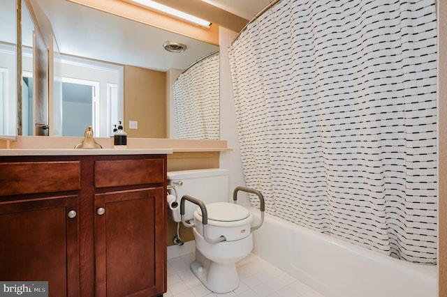 full bathroom featuring toilet, shower / tub combo, tile patterned floors, and vanity