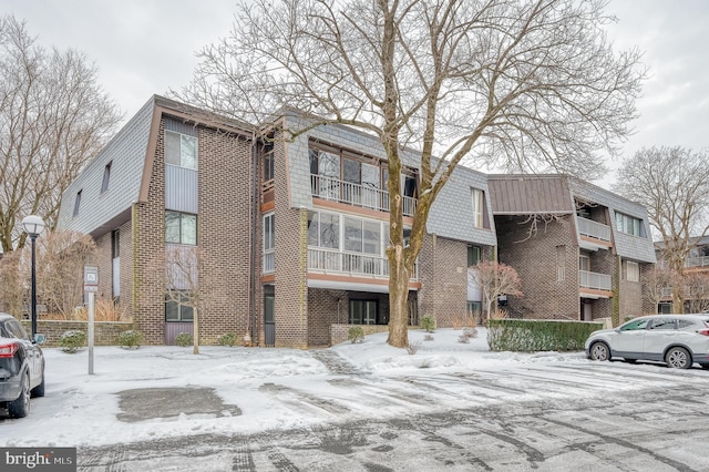 view of snow covered property