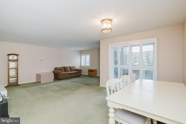 view of carpeted dining area