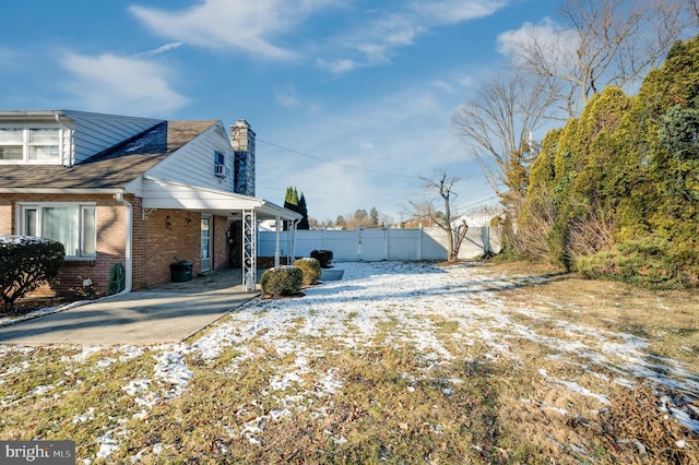 view of snow covered property