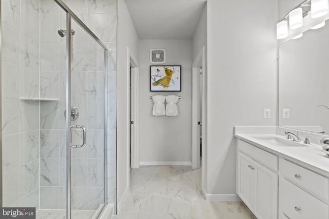 bathroom featuring vanity and a shower with door