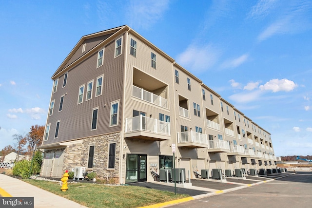 view of building exterior with cooling unit