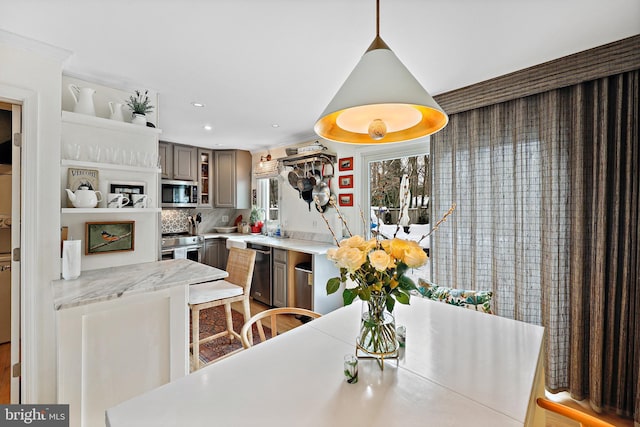 dining area featuring crown molding