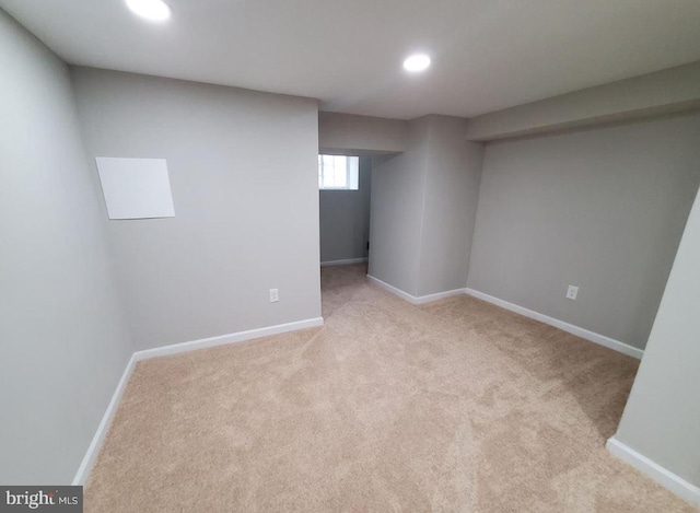 basement with light carpet